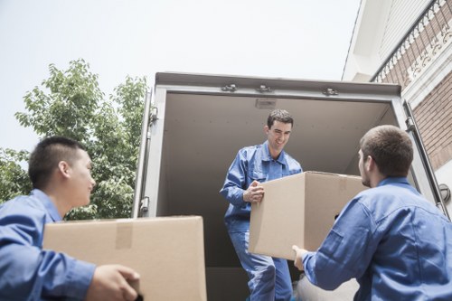 Van loading furniture for a move in Beckenham residential area
