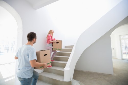 Furniture being carefully loaded into a moving van
