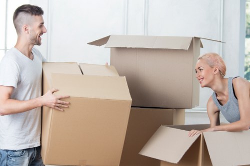 Professional movers handling furniture during a local move in Beckenham
