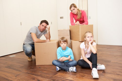 Moving team handling furniture with care during a house move
