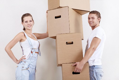 Professional movers loading items for an apartment move in Beckenham