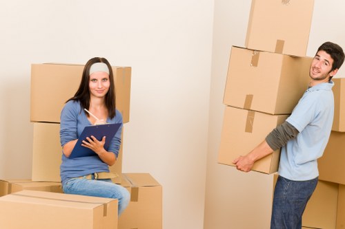 House removal team handling items in a Beckenham apartment move