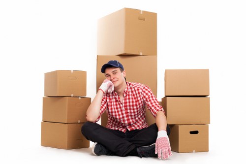 Packed boxes and furniture in a Beckenham home ready for moving day