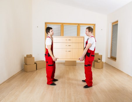 Moving boxes and furniture loaded into a truck