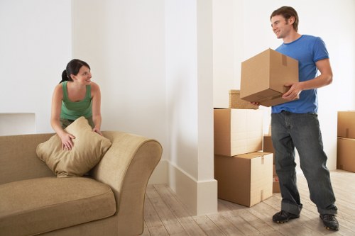 Prepared moving boxes and household items in a Beckenham property