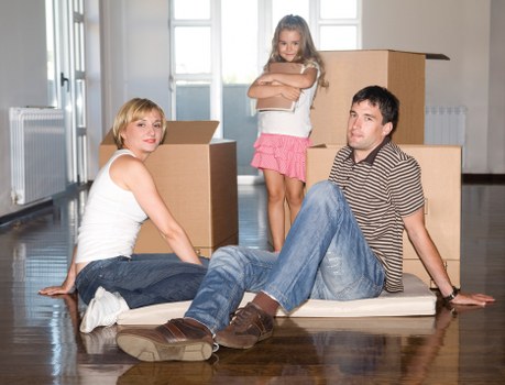 Boxes and household items being prepared for transport by removals van