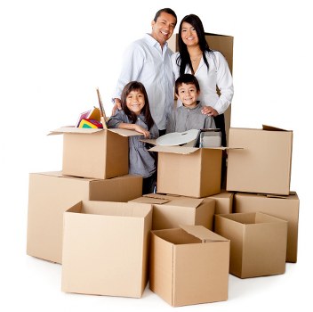 Moving boxes and wrapped furniture ready for transport in Beckenham